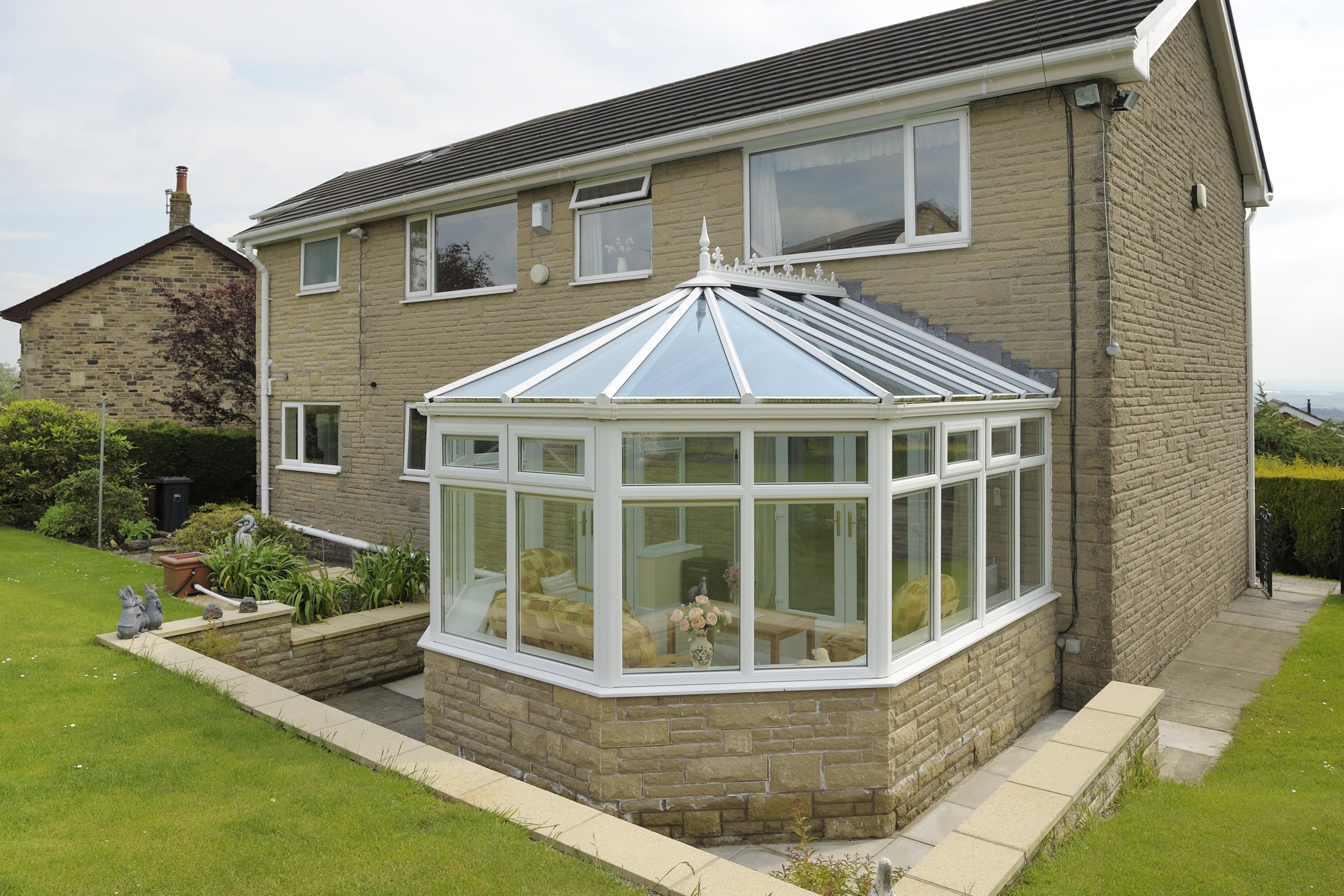 uPVC conservatory attached to brick house